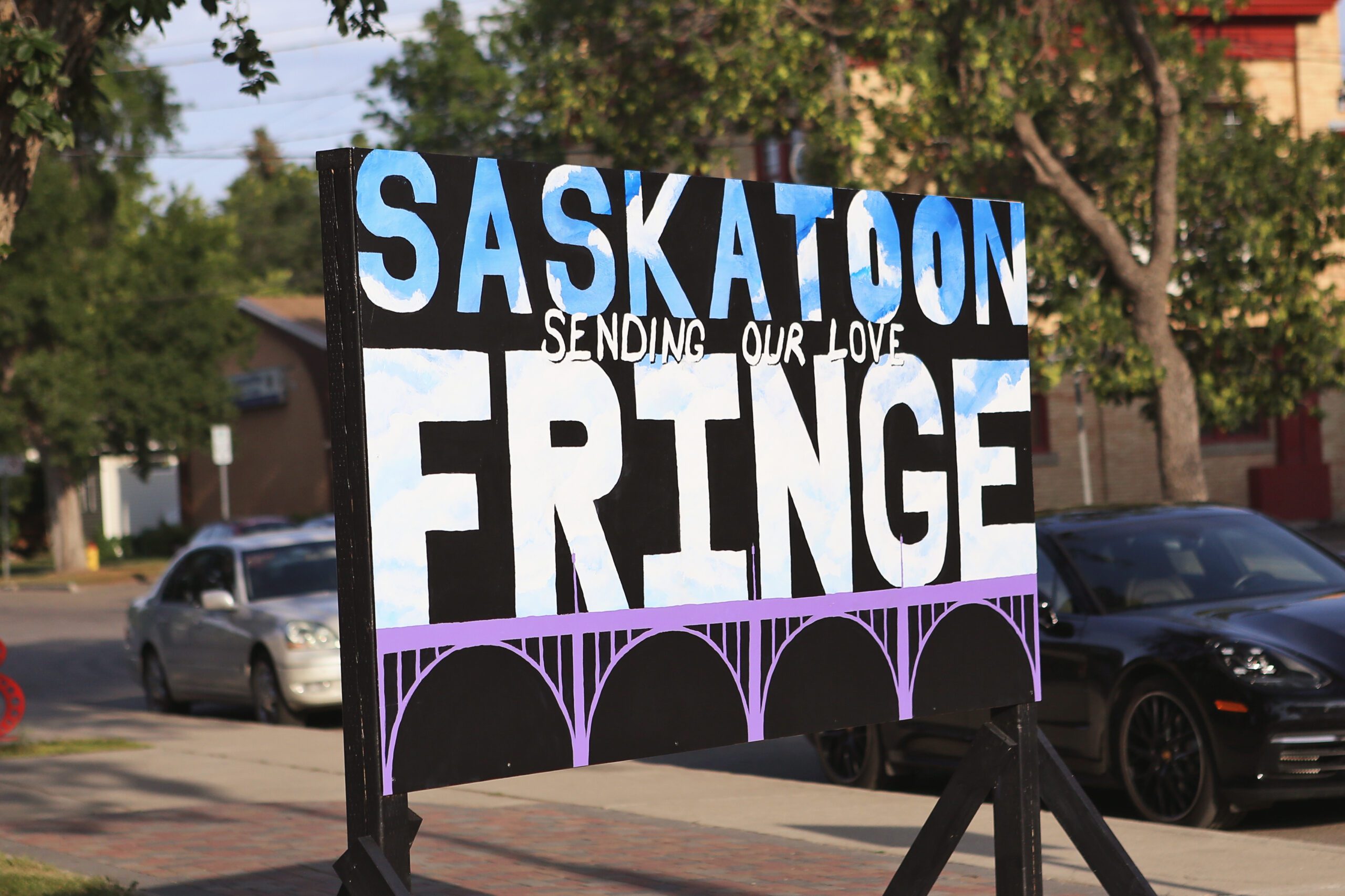 Sign with Saskatoon Sending our love Fringe, photo credit Nicole Stevenson